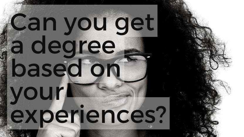 young woman with curly hair and dark black glasses thinking hard about getting a degree because of her life experiences